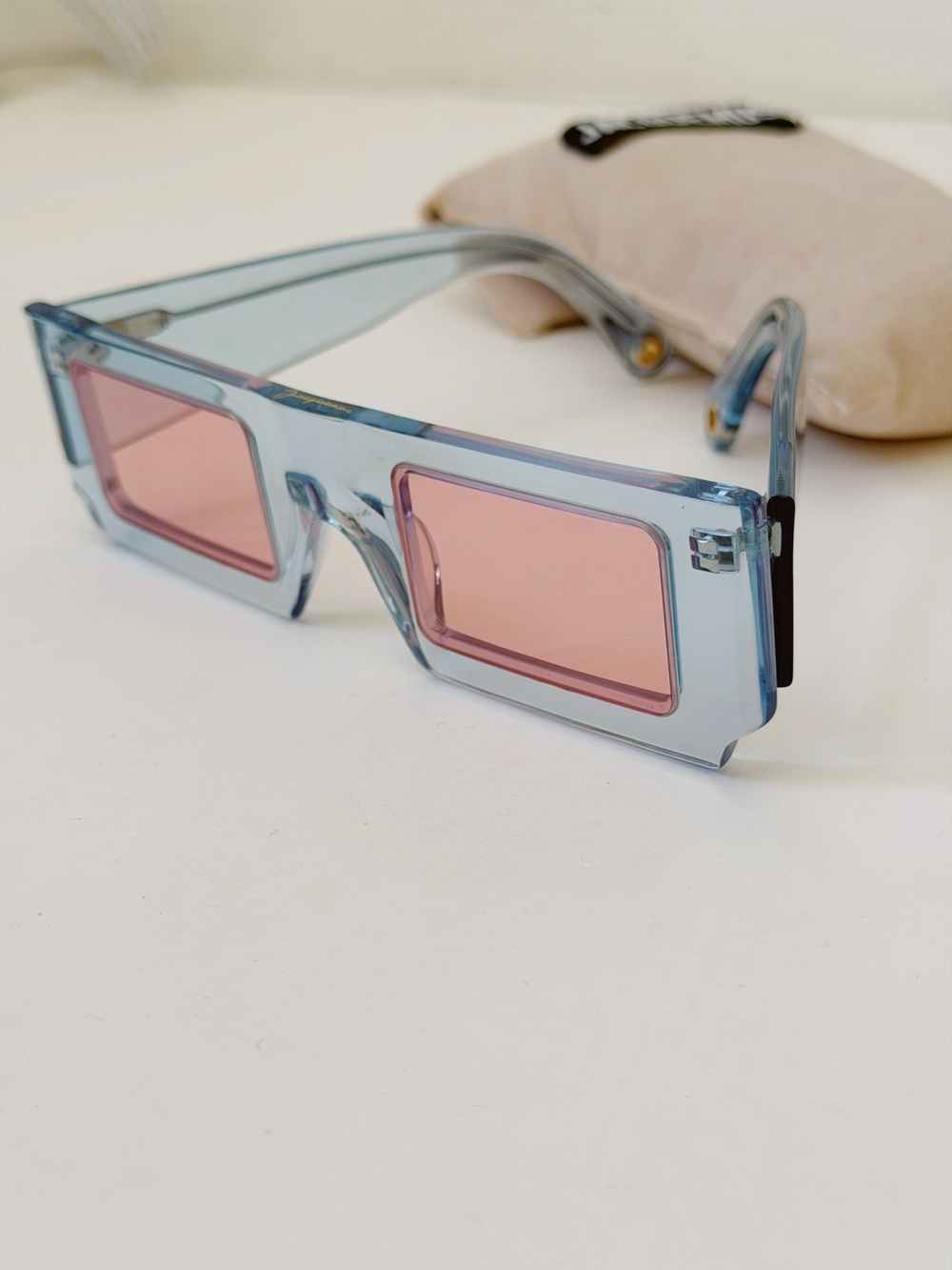 Jacquemus Translucent Light Blue Frame Sunglasses with Pink Lenses